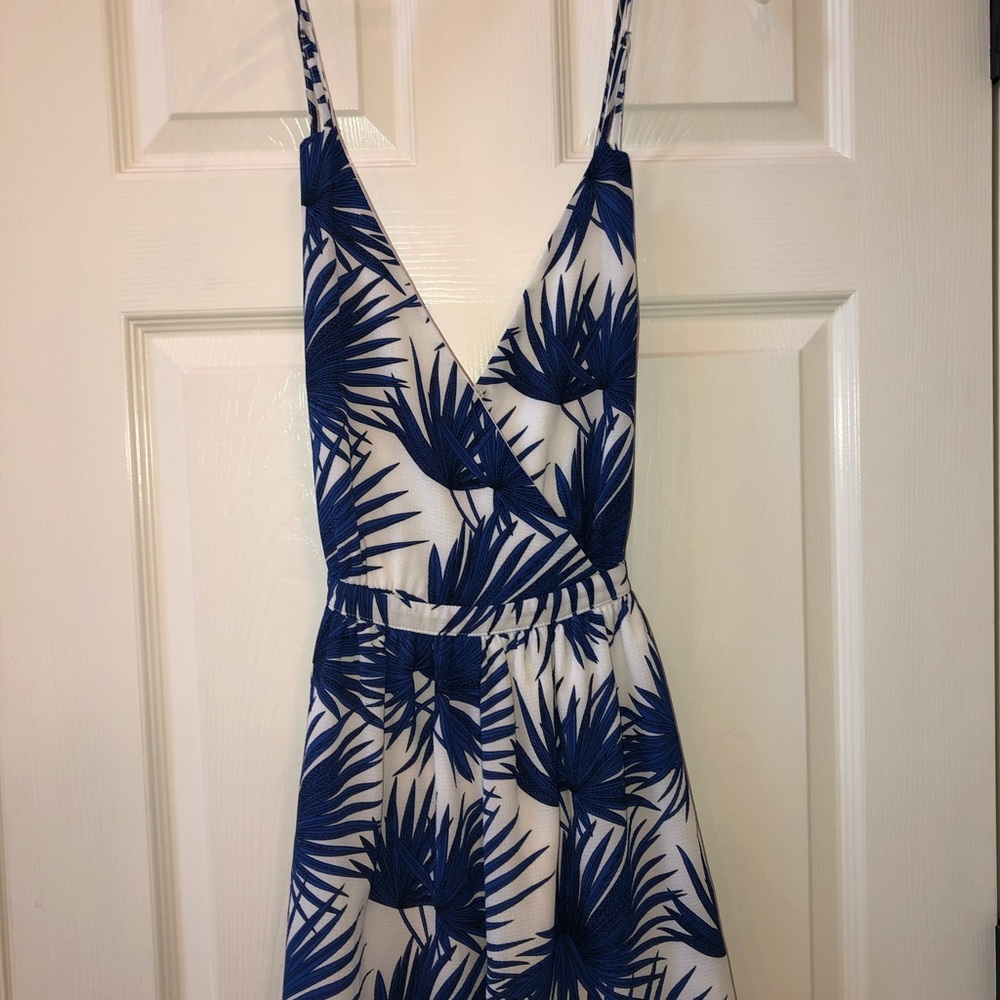 Blue and white tropical print romper